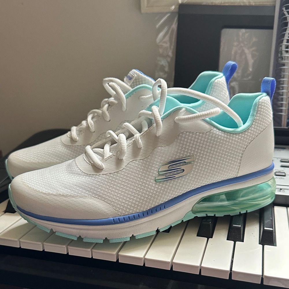Brand New Skechers Sneakers with Blue and Teal Accents